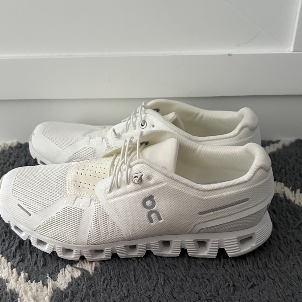 On Running All-White Athletic Shoes